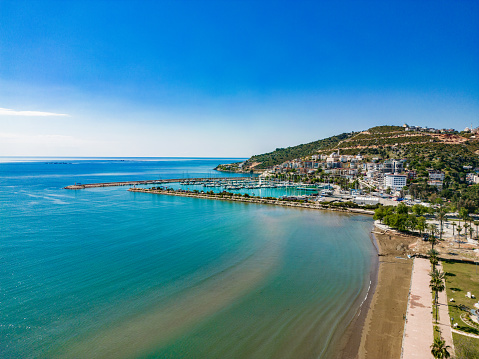 aerial view beach. Aerial view of the sea and beach in Finike district of Antalya. A Mediterranean morning. Drone shooting. The sea, the beach, the trees are visible.