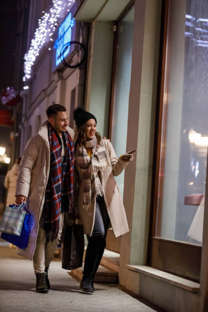 istock Heterosexual couple window shopping during Christmas holidays 1708795318