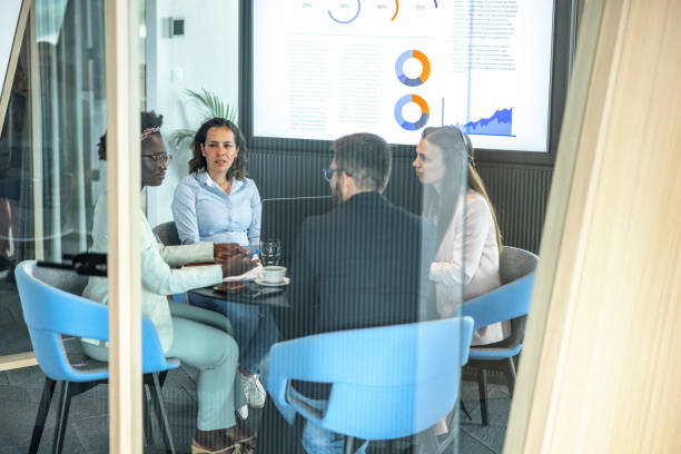 istock Team Of Young Executives Having A Meeting At A Modern Workplace 1708801262