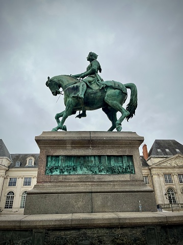 View of a statue of Joan of Arc on her horse on a square in the city of Orleans