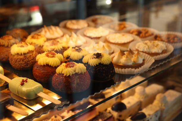 istock Different tasty desserts on counter in bakery shop, closeup 1708832221