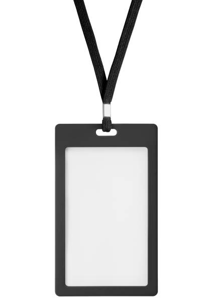 istock Blank bagde mockup isolated on white. Plain empty name tag mock up hanging on neck with string. Nametag with black ribbon and plastic paper holder. 1708833774