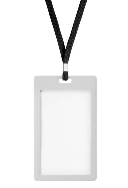 istock Blank bagde mockup isolated on white. Plain empty name tag mock up hanging on neck with string. Nametag with black ribbon and plastic paper holder. 1708834297