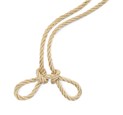 Hemp rope with knots isolated on white, top view
