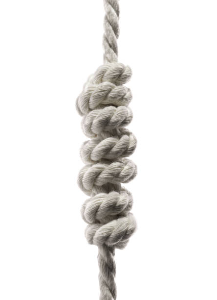 istock Hemp rope with knots isolated on white 1708874473