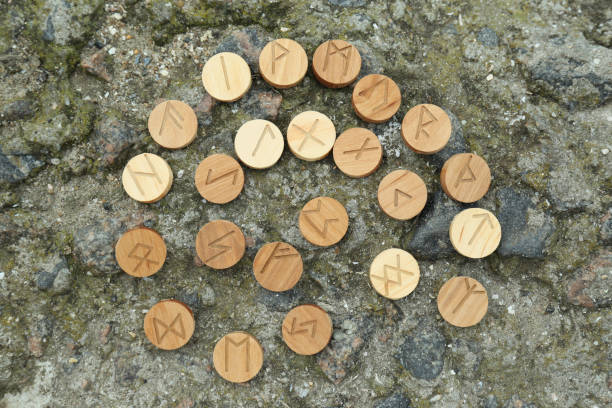 istock Many wooden runes on stone outdoors, flat lay 1708885962