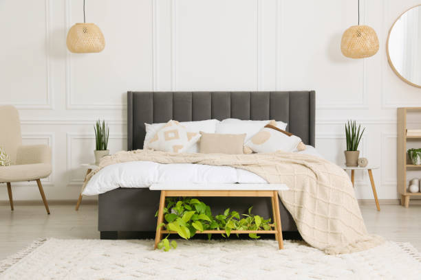 istock Stylish bedroom interior with large comfortable bed 1708897210