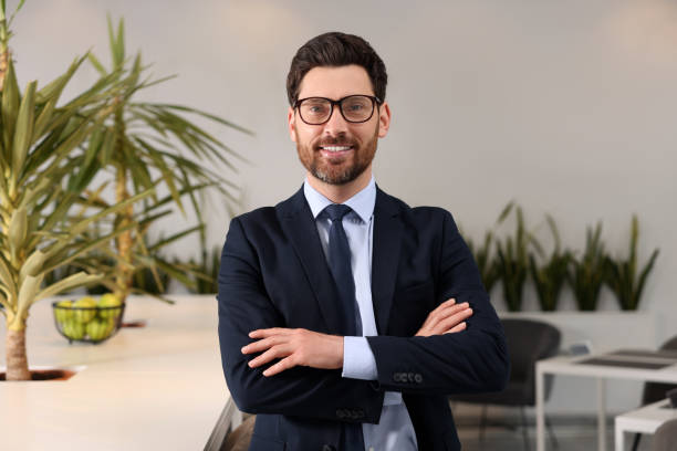 istock Confident male real estate agent in office 1708971561