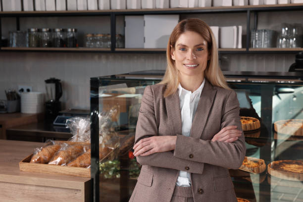 istock Happy business owner in bakery shop. Space for text 1708979665