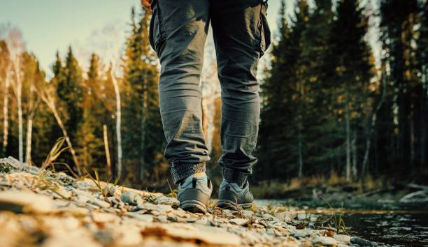 istock Mens foot steps in the countryside 1708986623