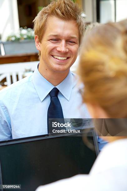 Young Businessteam At A Meeting Stock Photo - Download Image Now - Adult, Business, Cheerful