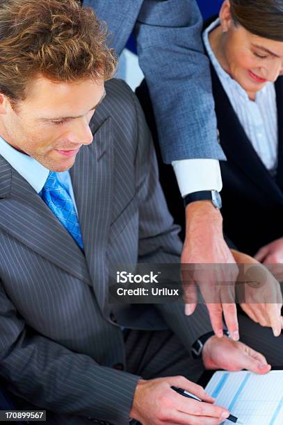 Business Team At A Meeting Stock Photo - Download Image Now - Adult, Adults Only, Business