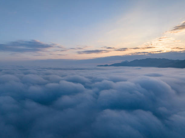 istock Sunrise over sea of clouds and valley 1709011805