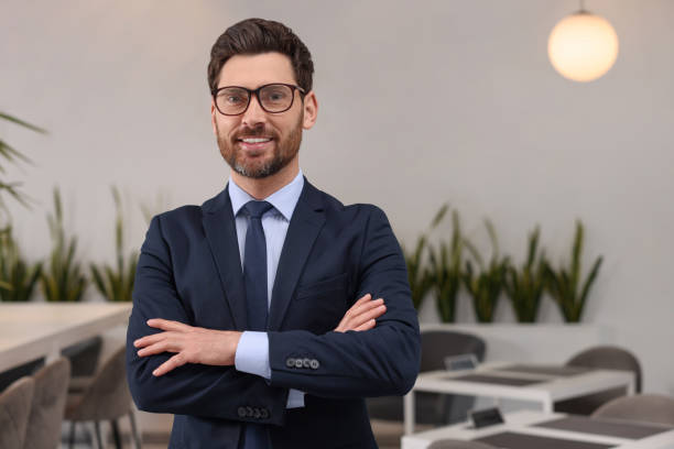 istock Happy real estate agent indoors. Space for text 1709017110