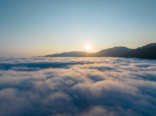 istock Sunrise over sea of clouds and valley 1709030995