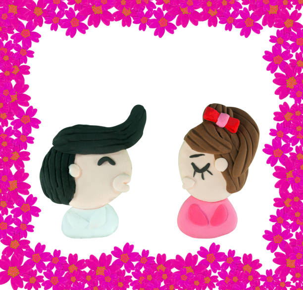 Set of Kissing people made from plasticine on white