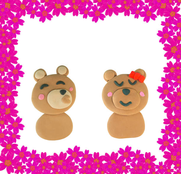 Set of Kissing bear made from plasticine on white background
