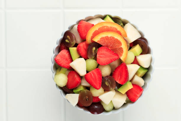 istock Top View Fresh Fruit Salad in the Bowl 1709051980
