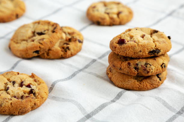 istock Homemade White Chocolate Cranberry Cookies on a Pink Plate, side view. 1709059630