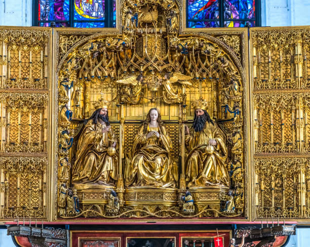 Triptych Altar St Mary's Church Gdansk Poland. Coronation of Mary Triptych by Master Michael in 1500s. Church originally from 1300s. Rebuilt after war.