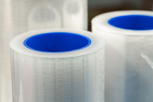 Packaging materials: tape and adhesive film