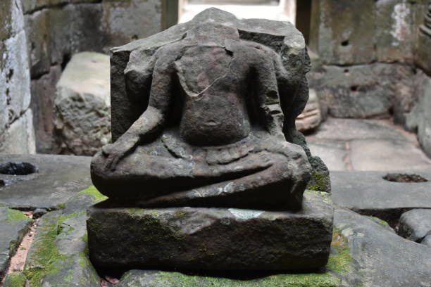 istock Headless Seated Buddha in Wat Preah Khan Corridor, Full Shot 1709190616