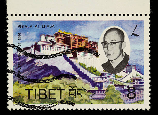 Vintage stamp Tibet Studio shot on black dalai lama stock pictures, royalty-free photos & images