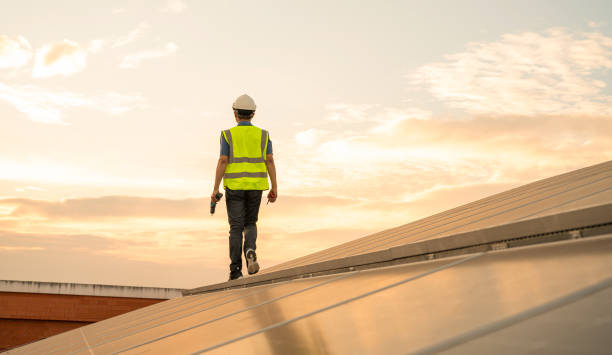 istock Male engineering working on checking and maintenance in solar power plant. 1709278017