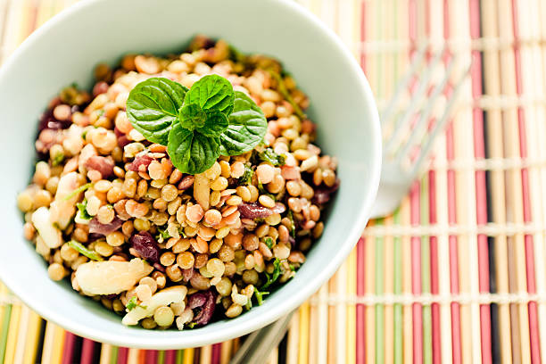 A portion of lentil salad with fresh mint.
