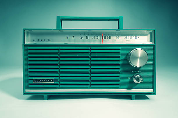 Retro Radio Retro AM/FM solid state transistor radio.  Cross processed. radio retro revival old old fashioned stock pictures, royalty-free photos & images