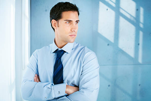 istock Determined businessman in a concrete office 170935312