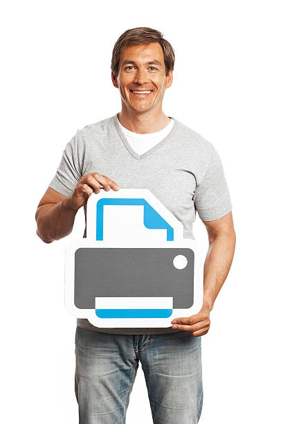Smiling man holding printer sign isolated on white background.  Image from \