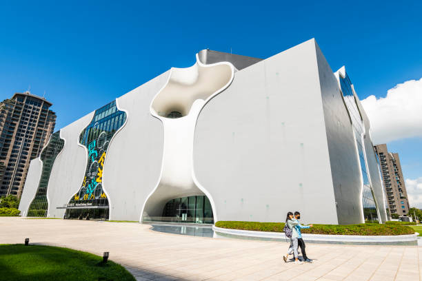 Taichung, Taiwan- August 27, 2023: Tourists passing by the National Taichung Theater in Taiwan. This is the only national performing arts center in central Taiwan.