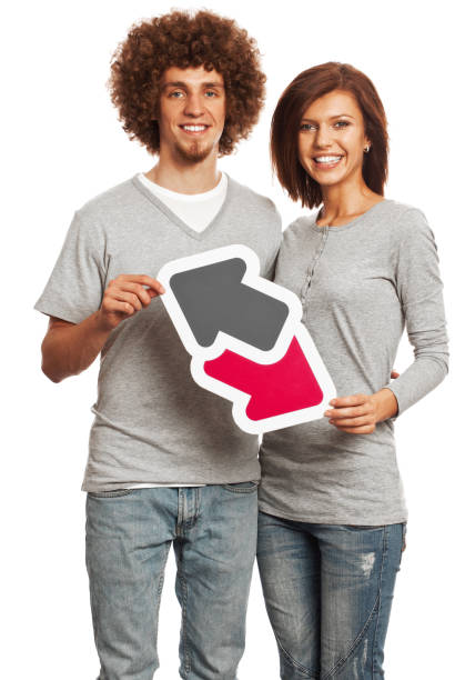 istock Smiling young couple holding data trade sign isolated on white 170939257