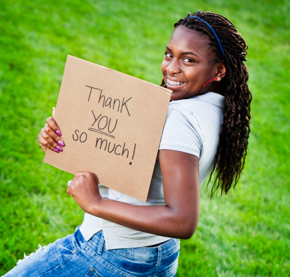 Teen Girl with Thank You Sign