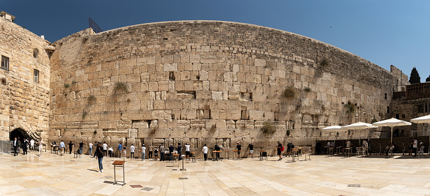 Jerusalem, Israel - September 22, 2023: Panoramic View of the Western Wall with prayers in sunny day
