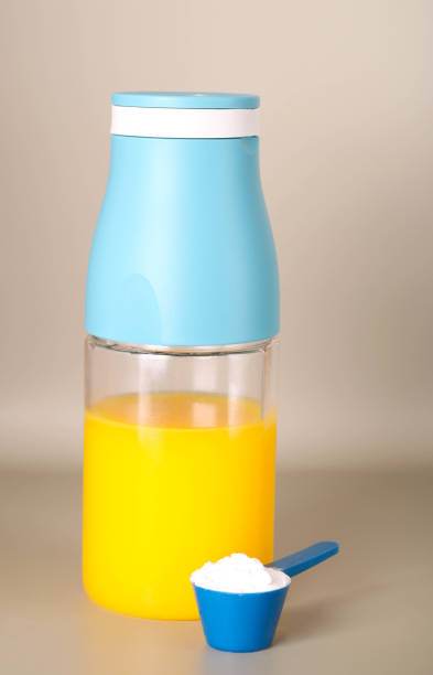 supplement-for-athletes-and-bottle-of-orange-juice.jpg?s=612x612&w=0&k=20&c=fXhqajvfbzoTe4SqatlW7A2OT8MUkCiO9YTUcF6RnM0=