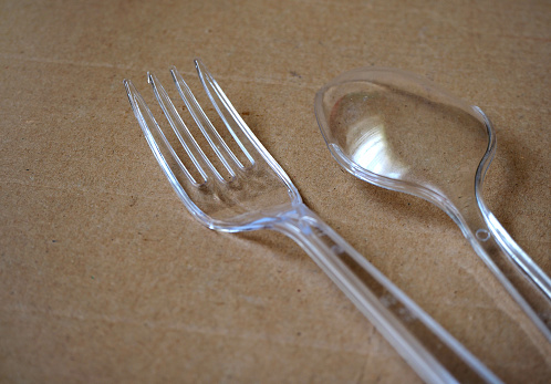 Plastic cutlery. Single-Use plastic fork and spoon.  Rady meal.
