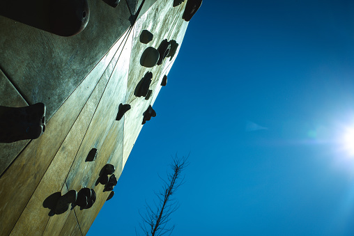 Detail of the wall of an outdoor climbing wall to practice climbing