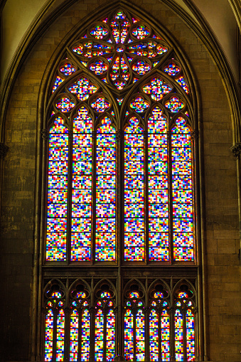 Cologne, North Rhine Westphalia, Germany - 25 August 2019: Colorful stained glass window inside the cathedral of Cologne by Gerhard Richter from 2003; Cathedral Church of Saint Peter