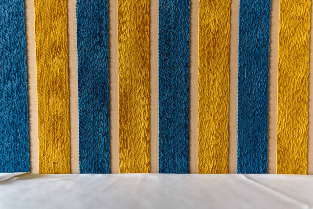 istock Striped blue and yellow colors with rough fabric texture, colorful background. 1709532885