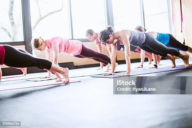 Group Yoga Class In Studio Stock Photo - Download Image Now - Active Lifestyle, Adult, Adults Only