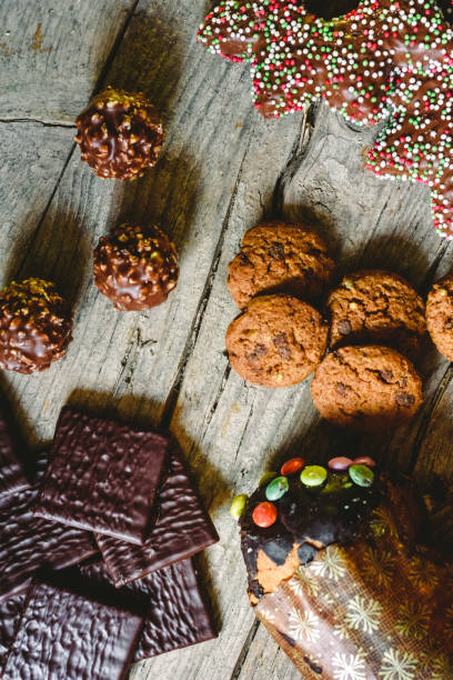 istock Chocolate chips and cookies with delicious topping, brown tones. 1709558499