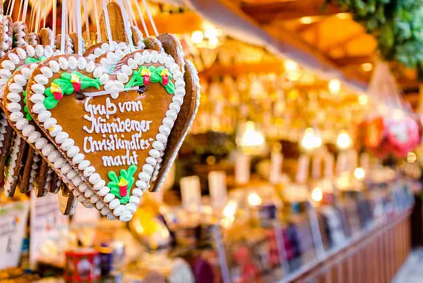 Gingerbread heart (Lebkuchenherz) at a Nuremberg Christmas Market stall (Christkindlesmarkt) reading: