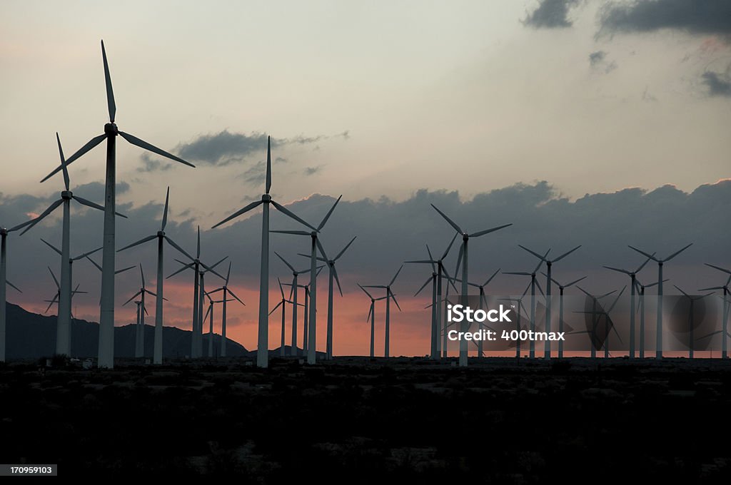 Atardecer de la turbina de viento - Foto de stock de Aerogenerador libre de derechos