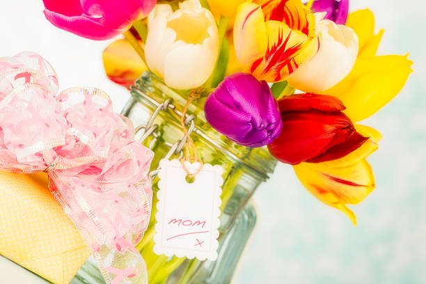 Beautiful Vibrant Tulips in Jar with Tag for Mom