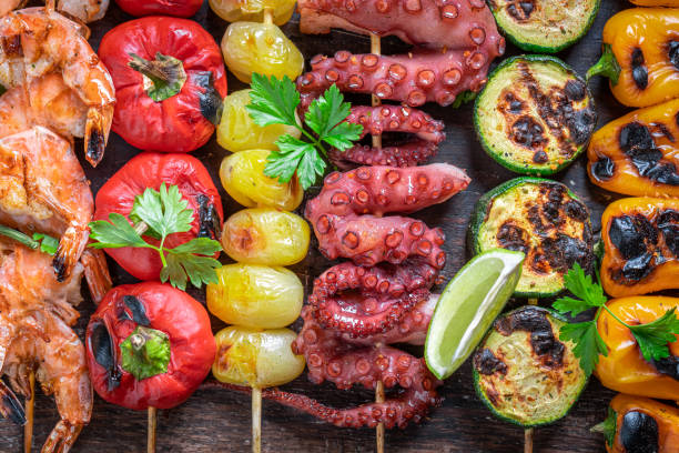 istock Hot grilled skewer with vegetables and seafood. 1709619733