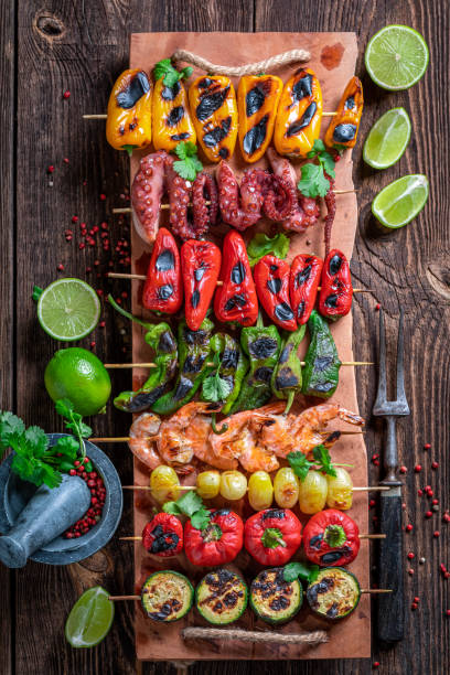 istock Hot grilled skewer cooking on grill with metal grate. 1709624738