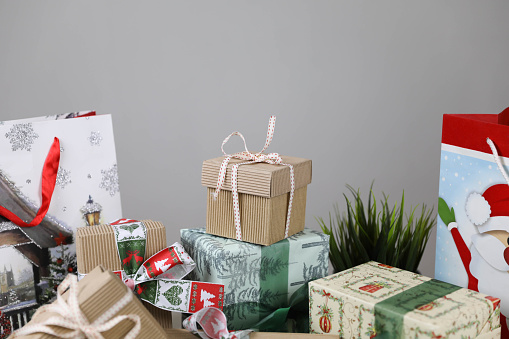 Original Christmas Advent Calendar made of paper bag and clip on wooden table