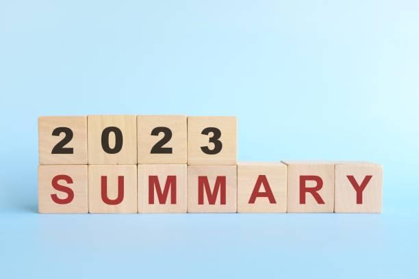 istock Year 2023 recap and summary concept. Wooden blocks typography in blue background. 1709629722